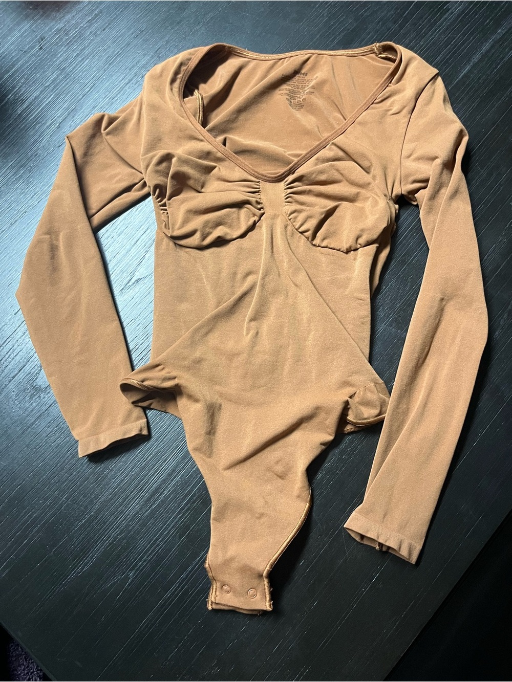 SKIMS Long-Sleeve One-Piece Bodysuit in Brown